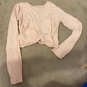 Forever 21 pink long sleeve workout top with knot in center